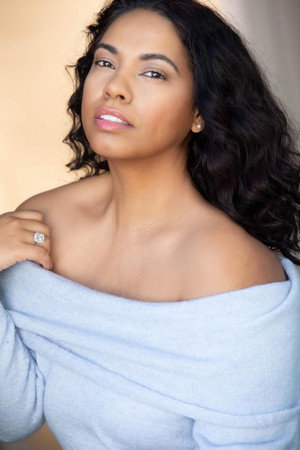 Photo of Mignon Farmani from the Latest Netflix gallery