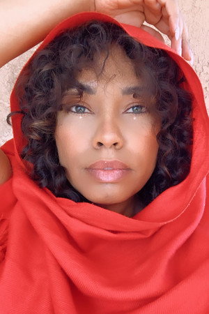 Photo of Mignon Farmani from the Latest Netflix gallery