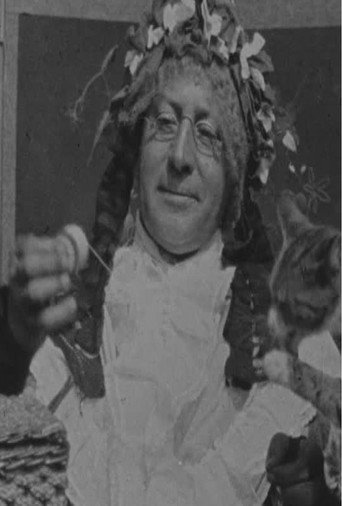 Movie poster for Grandma Threading Her Needle (1900)
