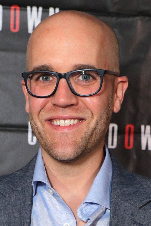 Photo of Justin Dec, Writing