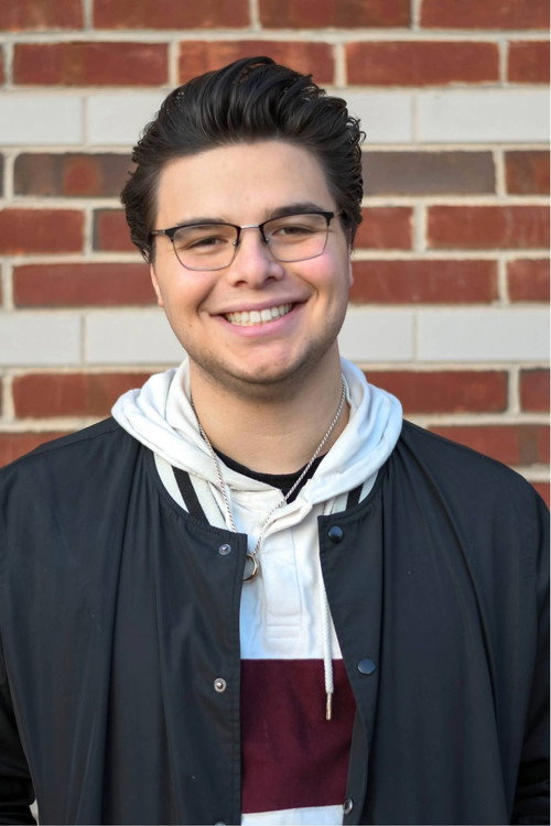 Photo of AJ Bucci, Writing
