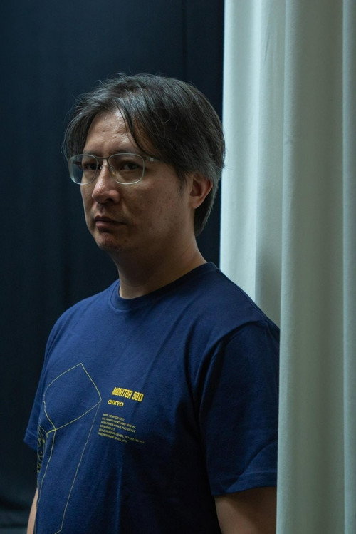 Photo of Amos Why, Directing