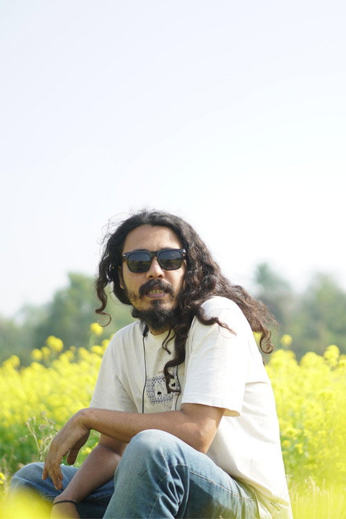 Photo of Omar Masum, Writing