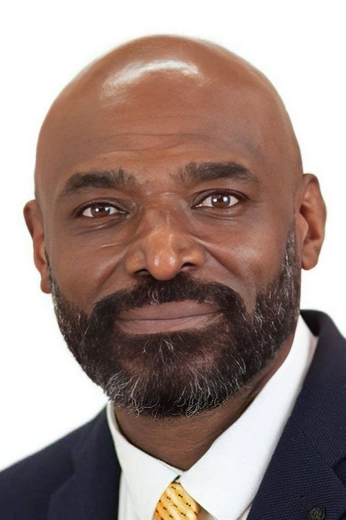 Photo of Wayne O. Reid, Acting