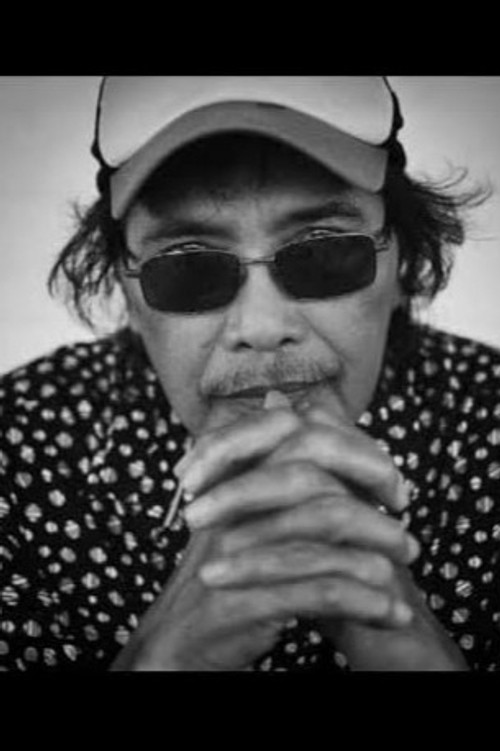 Photo of Carlo J. Caparas, Writing