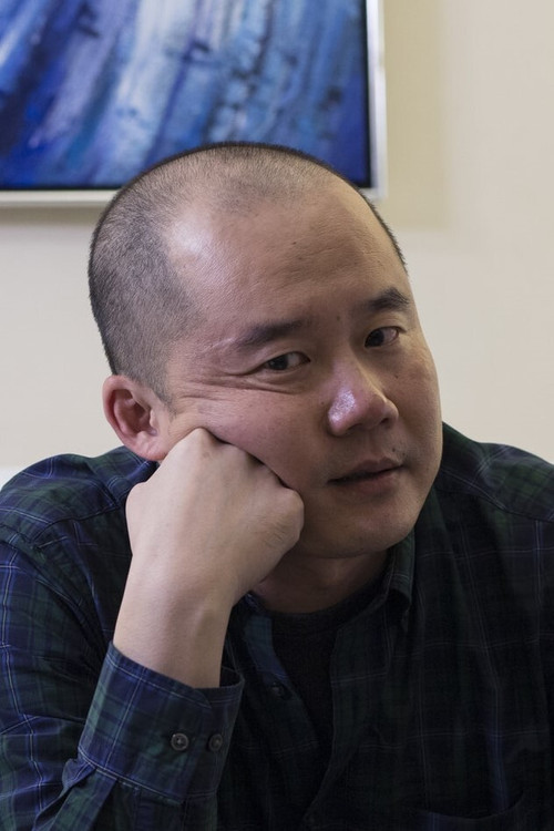 Photo of Chris Chow, Writing