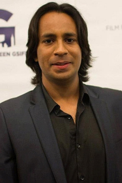 Photo of Navin Dev, Writing