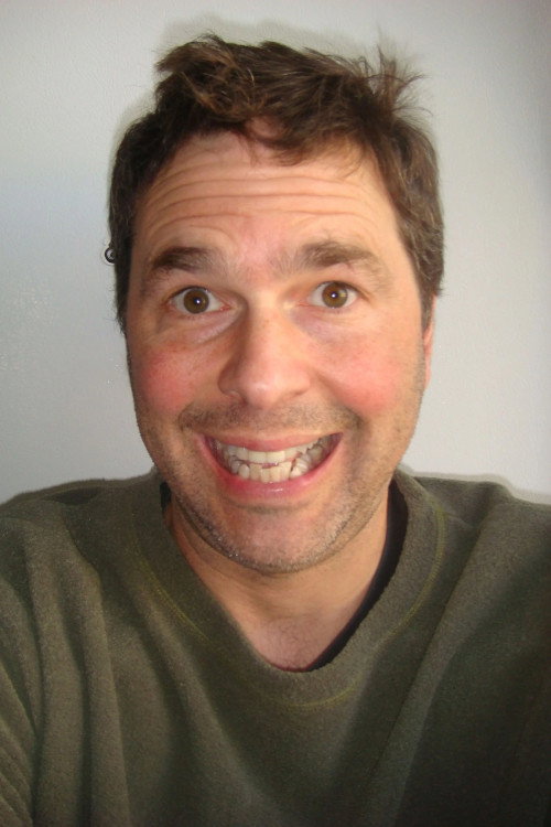 Photo of John Derevlany, Writing