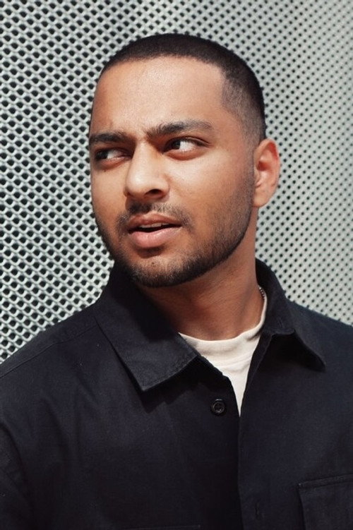 Photo of Nevin George, Writing