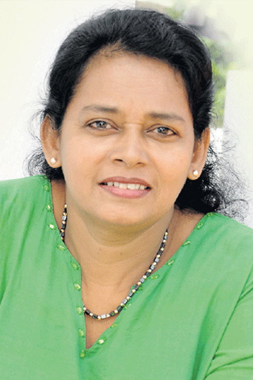 Photo of Mali Jayaweera, Acting