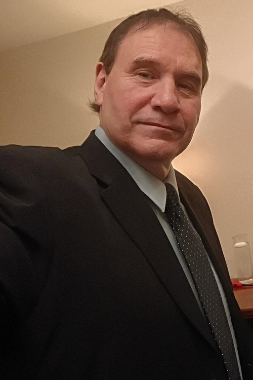 Photo of John W. Iwanonkiw, Acting