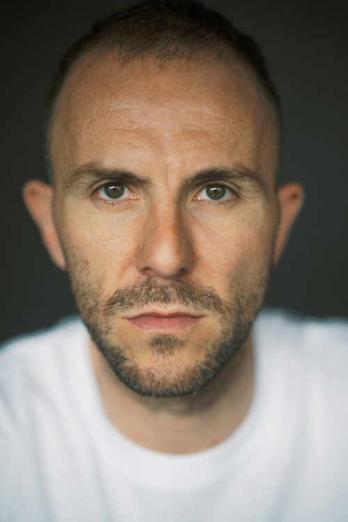 Photo of John Tueart, Acting