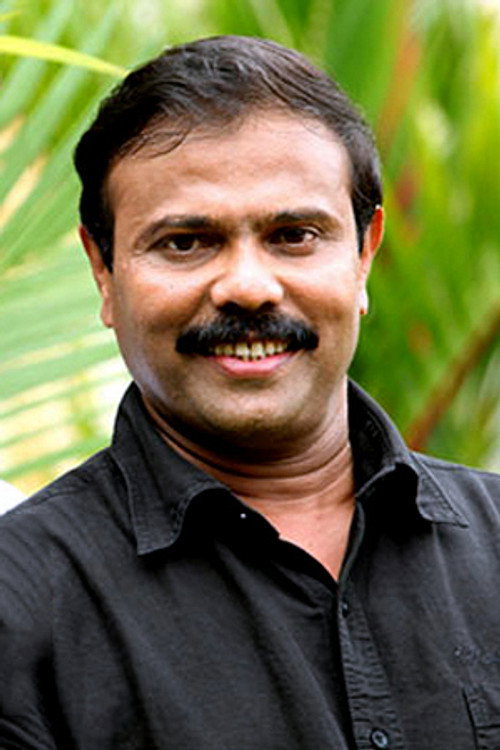 Photo of Siby K Thomas, Writing