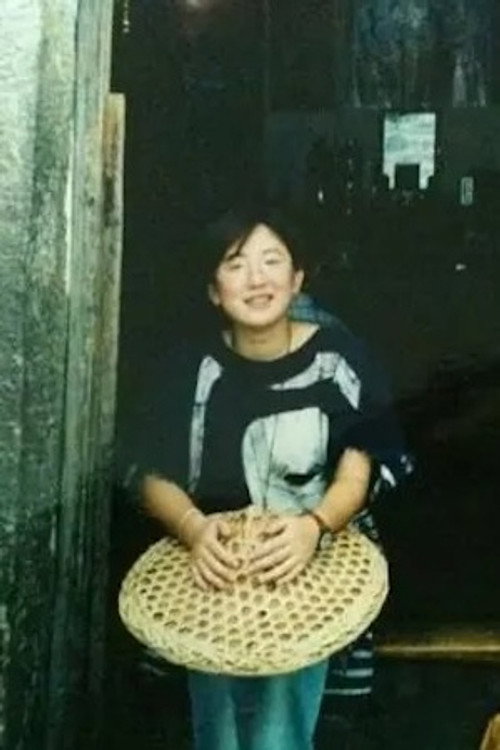 Photo of Xiaoya Mou, Writing