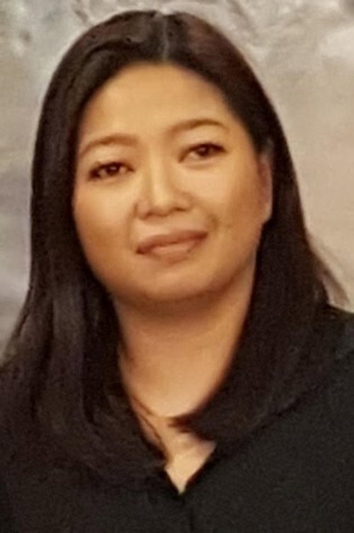 Photo of Carmi Raymundo, Writing