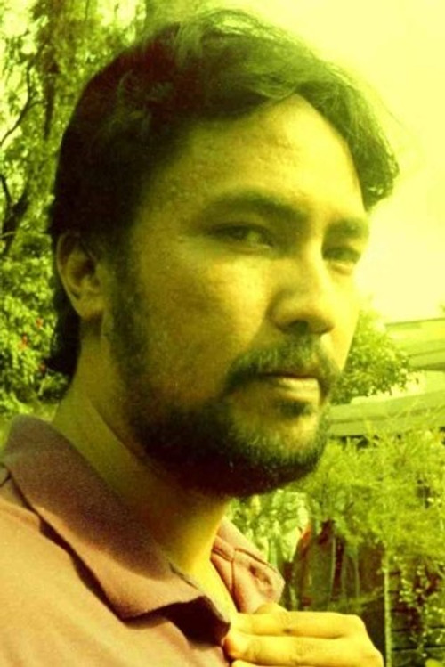 Photo of Abbo Q. Dela Cruz, Acting