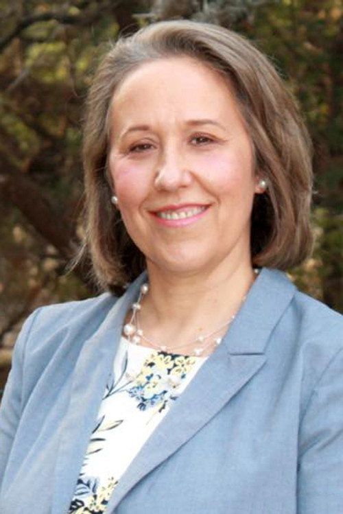 Photo of Dr. Christine Mann, Acting
