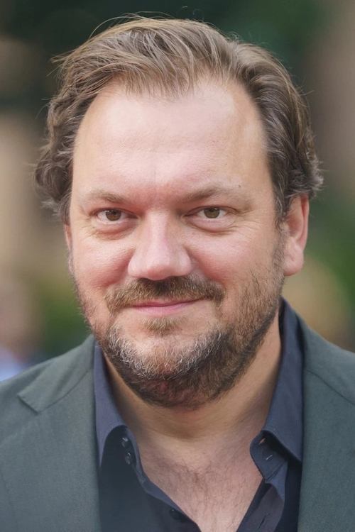 Charly Hübner profile