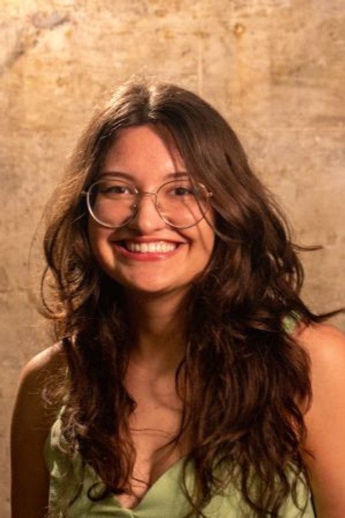 Photo of Carol Caetano, Production