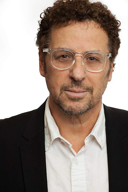 Photo of Adi Hasak, Writing