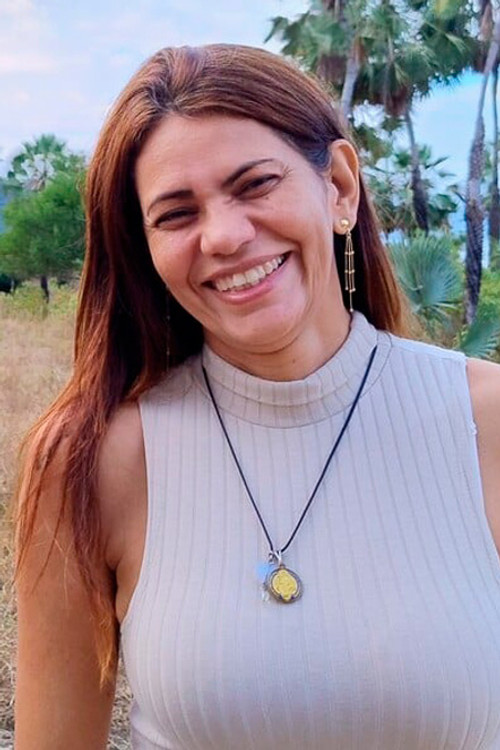 Photo of Dênia Cruz, Production