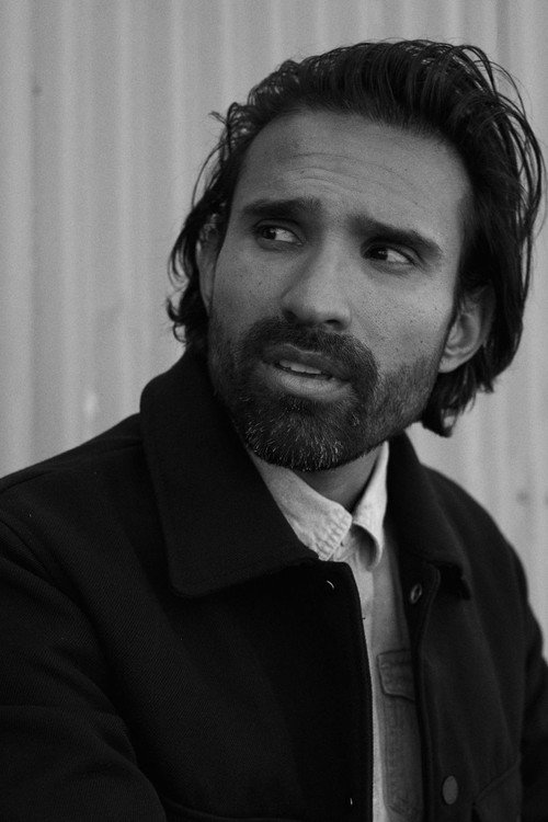 Photo of John Marco Lopez, Writing