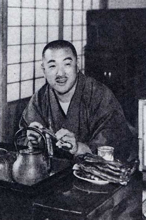 Photo of Kan Shimozawa, Writing