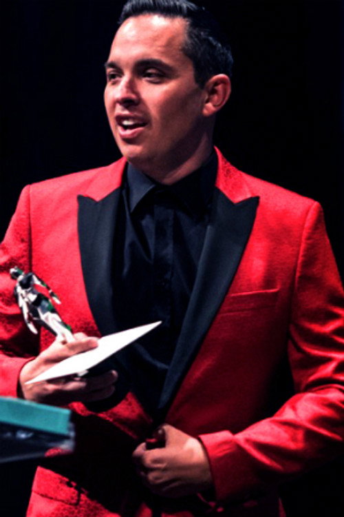 Photo of Tony E. Valenzuela, Writing