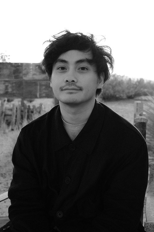 Photo of Derek Manansala, Writing