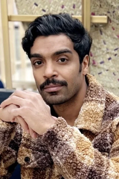 Photo of Faisal Al-Bloushi, Writing