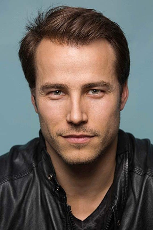 Karl E. Landler profile