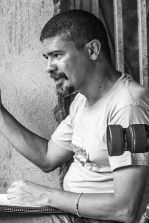 Photo of Carlos Tabares, Writing