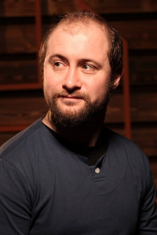 Photo of Eric Looney, Production