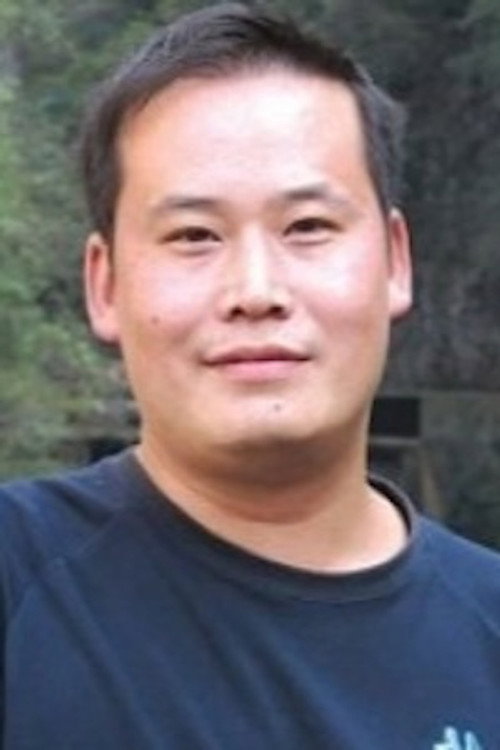 Photo of Jianghong Xiao, Writing