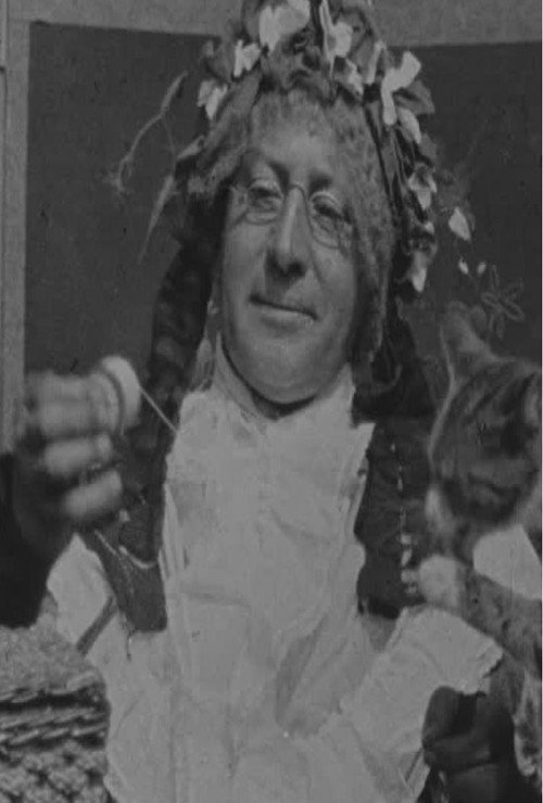 Movie poster for Grandma Threading Her Needle (1900)