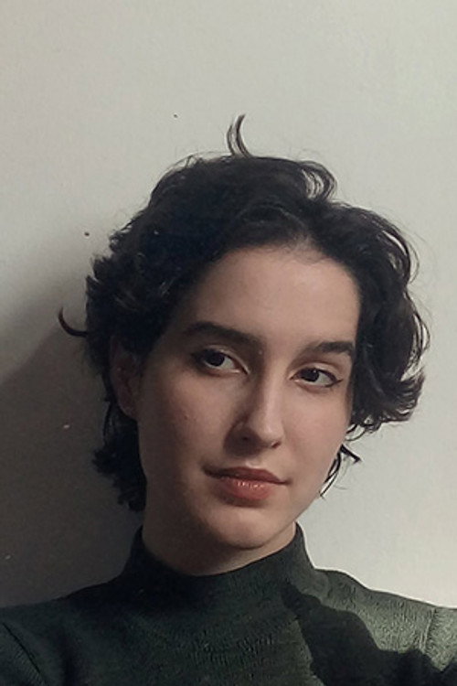 Photo of Lais Possamai, Writing