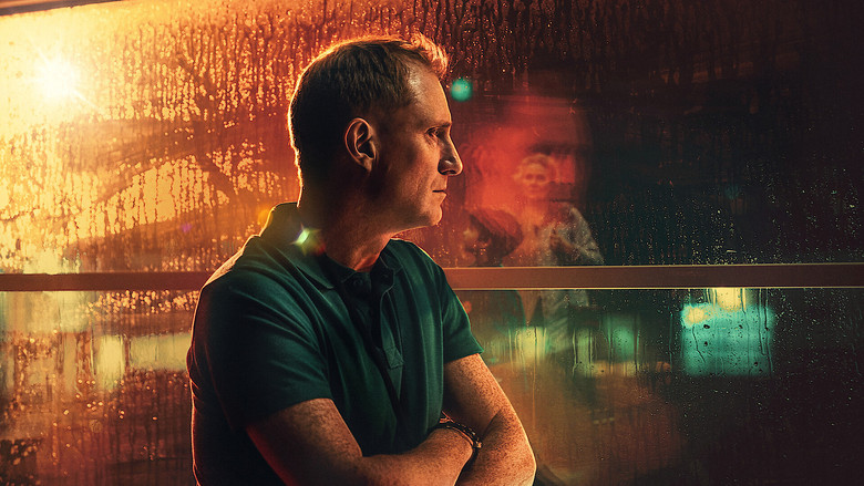 A detective stands in a dimly lit room, staring at a wall covered in case files and photographs, the weight of unsolved time pressing down on him.