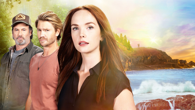 A quiet, intimate moment between Maggie and Cal as they walk through the forest, the light filtering through the trees, emphasizing the solitude of their environment.