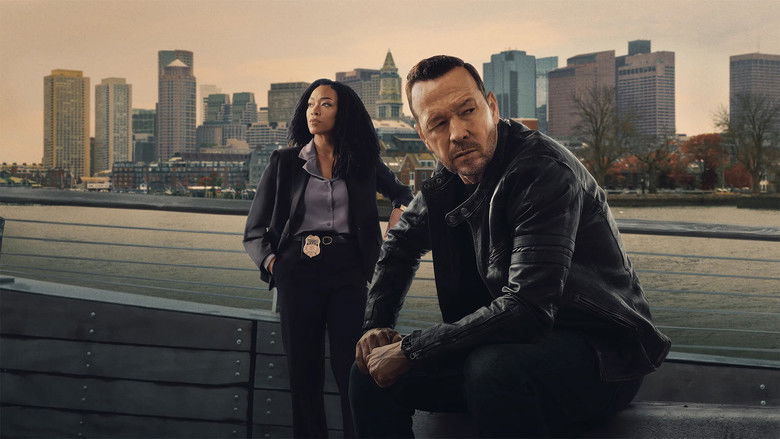 A tense interrogation scene inside a sterile, brightly lit police station room.