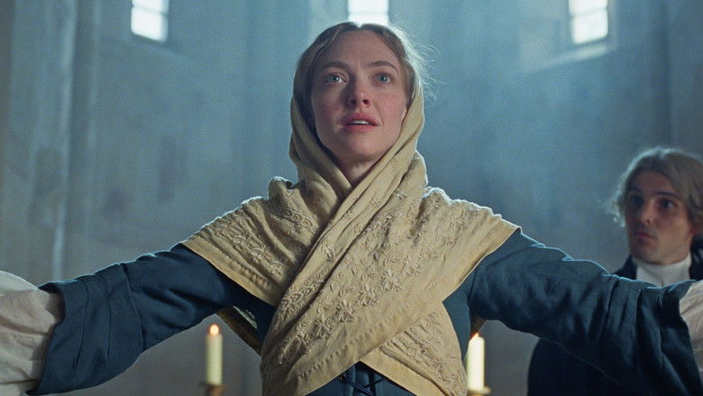 Ann Lee standing in a vast, desolate landscape