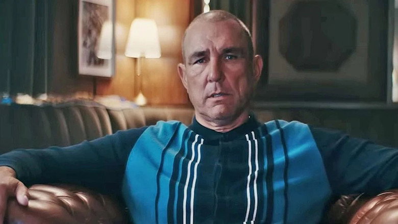 Vinnie Jones mid-tackle, his face a mask of intensity, the ball just out of reach