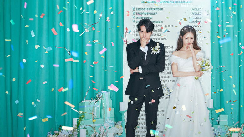A couple sits on a couch, surrounded by wedding magazines and fabric swatches, their expressions a mix of exhaustion and bewilderment