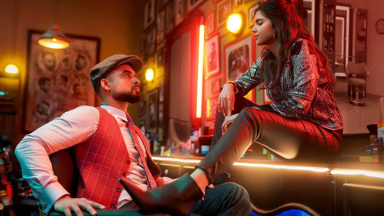 A crowded street scene, bodies pressed together, faces lit with neon and laughter