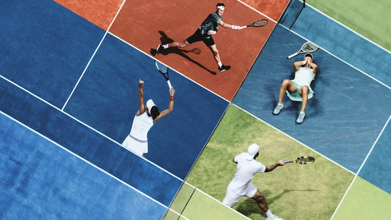 A player mid-serve, the ball frozen in the air, the court stretching out behind them like a stage.