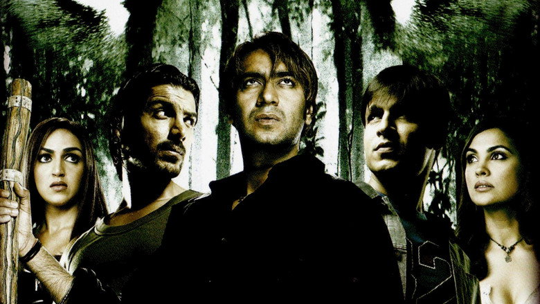 A tense moment in the jungle, where the characters stand in a tight circle, their faces illuminated by flickering light as the forest looms around them