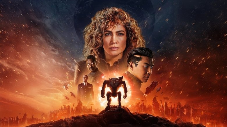 Atlas Shepherd (Jennifer Lopez) stands in a ruined cityscape, her mech suit glowing with blue energy as she stares down an unseen threat.