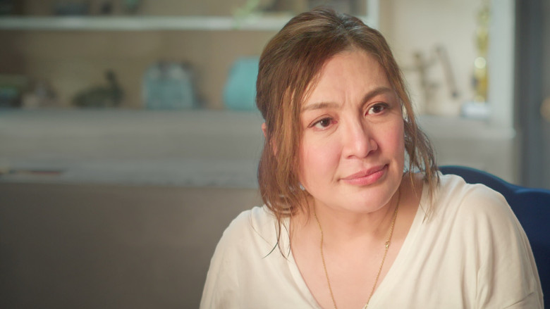 Maricar and Mateo share a quiet moment in the kitchen, the weight of unspoken words hanging between them.
