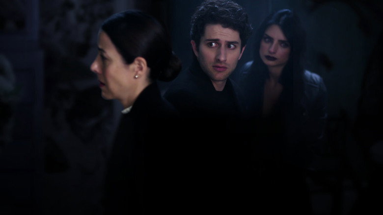 The de la Mora siblings stand in a crowded funeral home, their expressions a mix of exhaustion and barely contained chaos