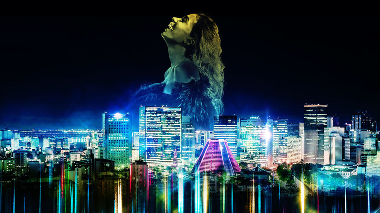 Anitta in a recording studio, mid-performance, bathed in neon light