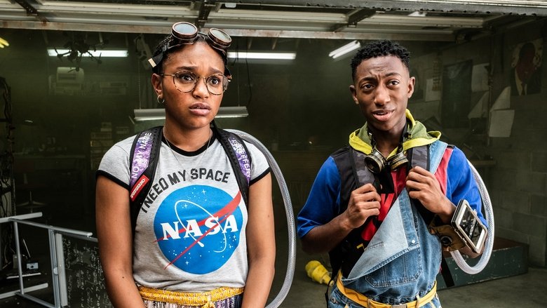 Two teenagers in hoodies stand in a dimly lit alley, their faces illuminated by the glow of makeshift time machines strapped to their backs